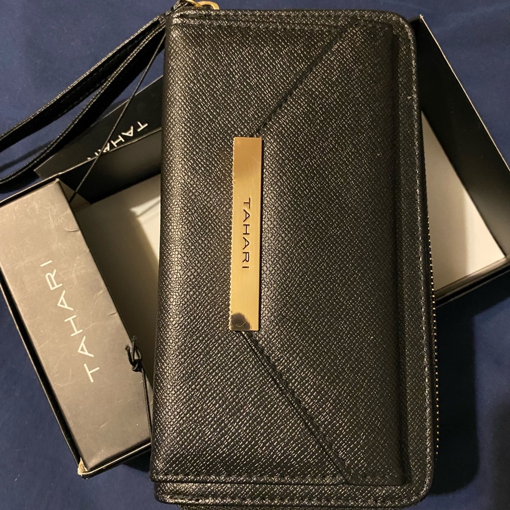 Never used!  Still attached to box!  Tahari wallet.